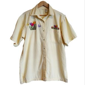 Vintage yellow button down shirt with pretty embroidery patches on front/back.